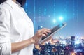 Multiple exposure of female programmer with tablet, digital binary code and night city. Royalty Free Stock Photo