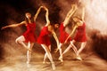 Multiple exposure of young woman dancing in a red dress