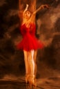 Multiple exposure of young woman dancing in a red dress