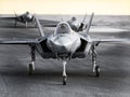 Multiple F35 military jet strike aircraft preparing for takeoff on a strike mission.