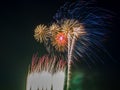 Multiple Fireworks burst in the night sky Royalty Free Stock Photo