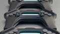 Multiple futuristic black game controllers stacked in rows Royalty Free Stock Photo