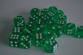 Multiple green plastic arcylic d6 six sided die dice variable focus Royalty Free Stock Photo