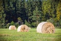 Multiple hay rolls on a field in summer in Hiiumaa, Estonia Royalty Free Stock Photo