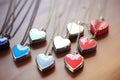 multiple heart-shaped lockets on a string