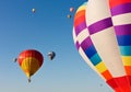 Multiple hot air balloons lift off