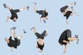 Multiple image of young man break dancing over light blue background Royalty Free Stock Photo