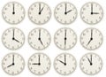 Set of office clocks showing various time isolated on white background Royalty Free Stock Photo