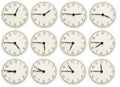 Set of office clocks showing various time isolated on white background Royalty Free Stock Photo