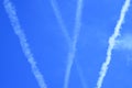 Multiple jet streams of aiplane on blue sky