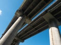 Multiple Lane Highway  bridge with reinforced concrete columns. Bottom view Royalty Free Stock Photo