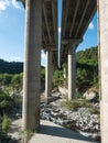 Multiple Lane Highway bridge with reinforced concrete columns over a river