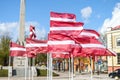 Multiple Latvia flags waving in wind