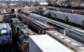 St. Louis, Missouri, United States-circa 2018-multiple lines of train cars lined up on train tracks in trainyard, covered hoppers