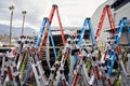 Multiple Little Giant ladders in front of hardware store