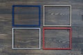 Multiple many blank small picture frames on wooden wall. For photo frames on wooden background