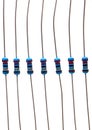 Multiple metal film precision resistor components in white background