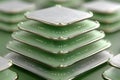 Stack of Microchips on Green Surface - Technology Concept for Electronics and Computing Design Generative AI Royalty Free Stock Photo