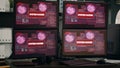 Multiple monitors displaying hacking warning alert after security breach Royalty Free Stock Photo