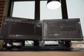 Multiple monitors running programming html code Royalty Free Stock Photo