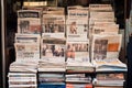 Multiple newspapers piled on top of each other, forming a stack of informative periodicals., Newspapers are arranged on a market Royalty Free Stock Photo