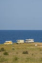 MULTIPLE OLD CARAVANS CAMPING AT THE SEA COAST Royalty Free Stock Photo