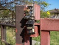 Multiple padlocks on a steel gate to securely lock it Royalty Free Stock Photo