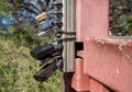 Multiple padlocks on a steel gate to securely lock it Royalty Free Stock Photo