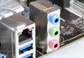 Multiple ports on modern computer mainboard show with USB 3.1, LAN, audio ports Royalty Free Stock Photo