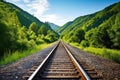 multiple railroad tracks converging towards a set of hills Royalty Free Stock Photo