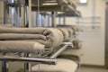 multiple rails with towels in a commercial laundry room Royalty Free Stock Photo