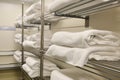 multiple rails with towels in a commercial laundry room Royalty Free Stock Photo