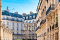 Residential buildings in Batignolles, Paris on a sunny day under the blue sky