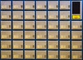 Multiple rows of golden post office boxes Royalty Free Stock Photo