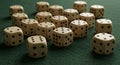 Multiple Rustic Dice Scattered on Green Felt Table Royalty Free Stock Photo