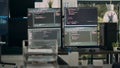 Multiple screens showing programming code in empty software it agency desk