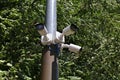 Multiple security cameras on a lamp post Royalty Free Stock Photo