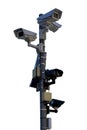 Multiple security cameras on pole. isolated