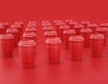 Multiple shiny red plastic coffee cups in a row on red background, flat colors, single color disposable paper cup, 3d rendering Royalty Free Stock Photo