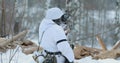 Multiple shots. Man Dressed As German Wehrmacht Infantry Soldiers In World War II Hidden Sitting With Weapon In An Royalty Free Stock Photo