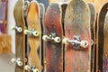 multiple skateboards displayed on vertical stand Royalty Free Stock Photo