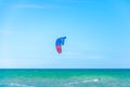 Multiple sports man flying on their kite boarding