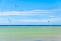 Multiple sports man flying on their kite boarding