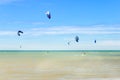 Multiple sports man flying on their kite boarding