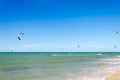 Multiple sports man flying on their kite boarding