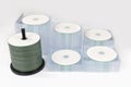 Multiple stacks DVD / CD boxes on light gray background Royalty Free Stock Photo