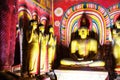 Multiple statues of Buddha inside cave Golden temple in Dambulla, Sri Lanka Royalty Free Stock Photo