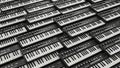 Multiple Synthesizer Keyboards Arranged in Rows Royalty Free Stock Photo