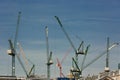 Multiple Tower Cranes Installed over a Construction Site