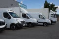 Multiple trucks park in a large parking Royalty Free Stock Photo